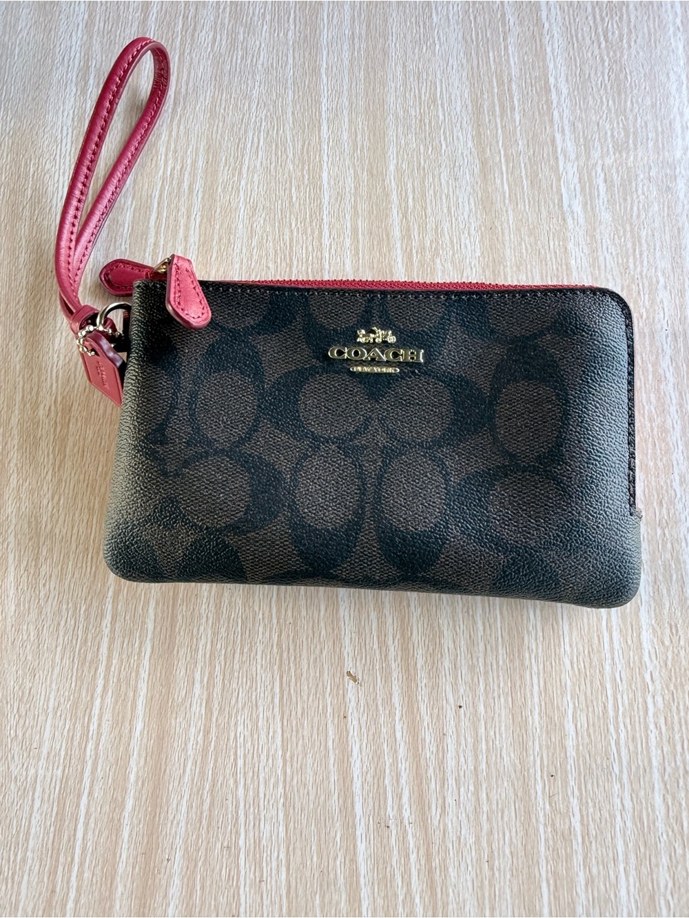 Coach Brown Signature Canvas Wristlet with Pink Trim